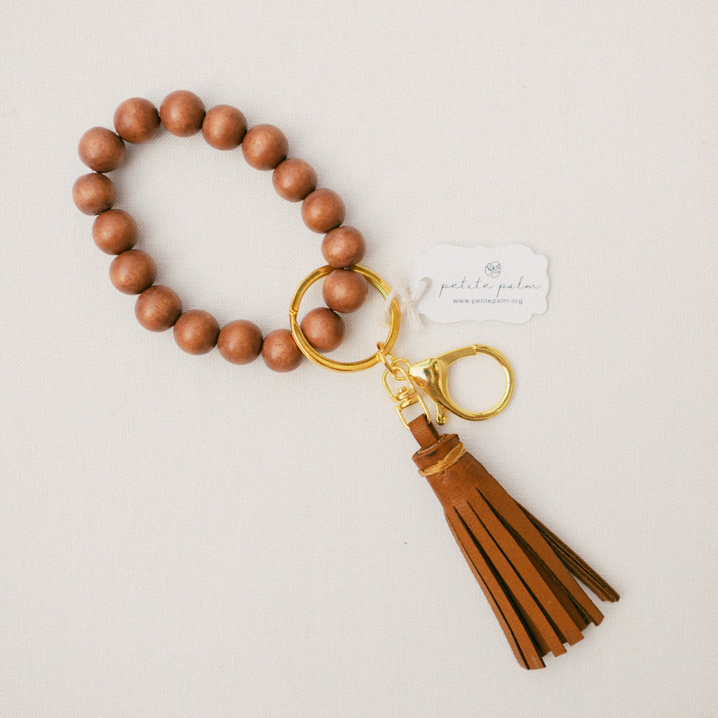 Kokoye Beaded Wristlet & Leather Tassel